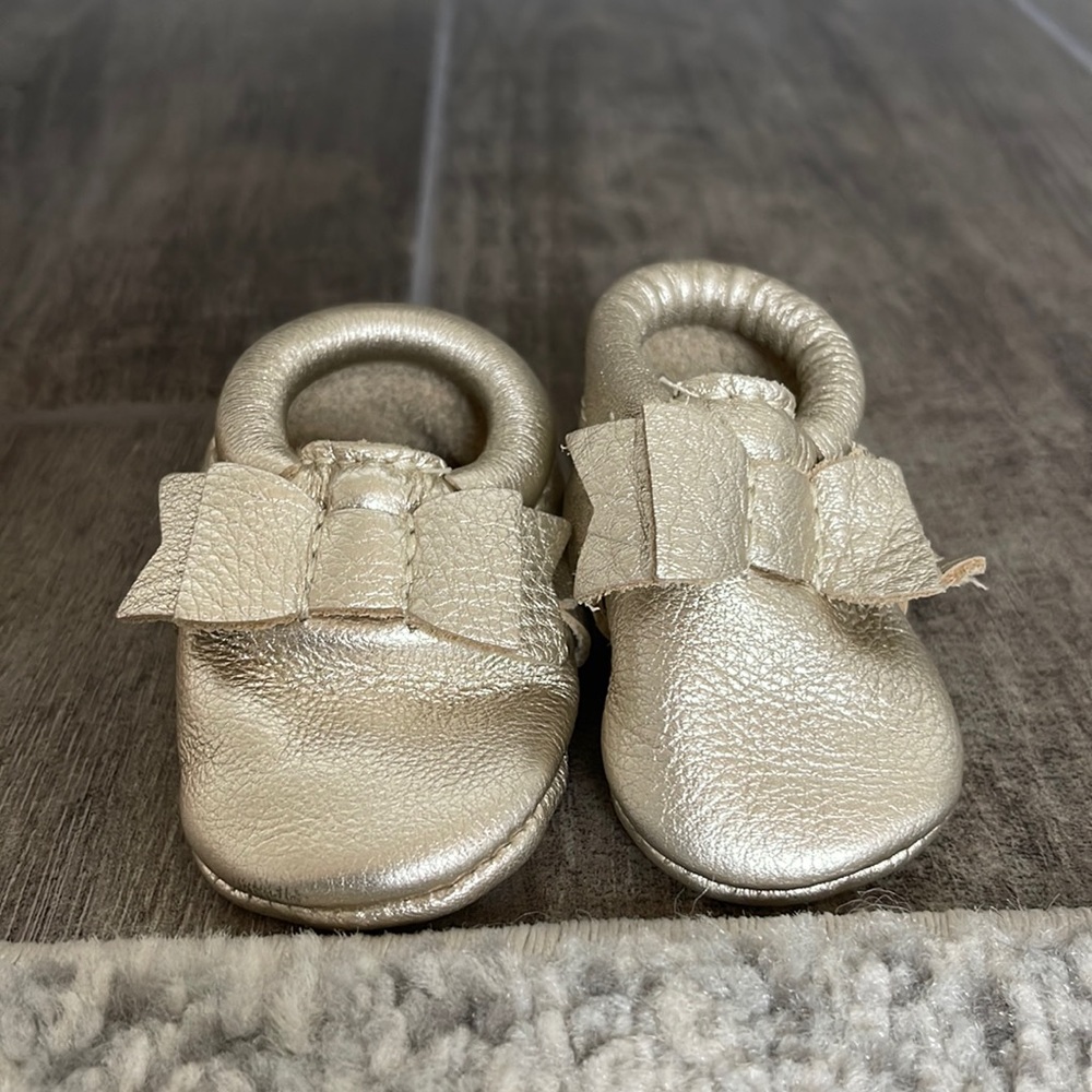 Newborn size Freshly Picked gold baby moccasins